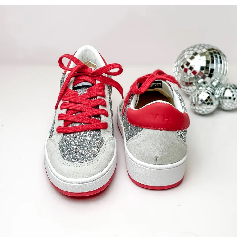 Woman’s guess glitter tennis shoes in silver size 6.5